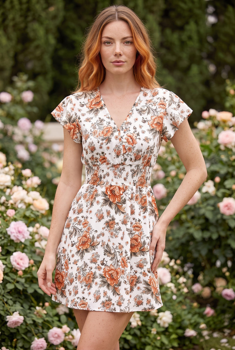 Floral Short Sleeve Smocked Mini Dress in patterned – photo 4