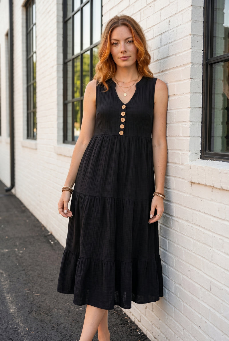 Schwarzes Midikleid mit V-Ausschnitt und Stufenrock – Foto 5